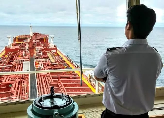 Navigating Officer during his watch hours on the bridge of the ship