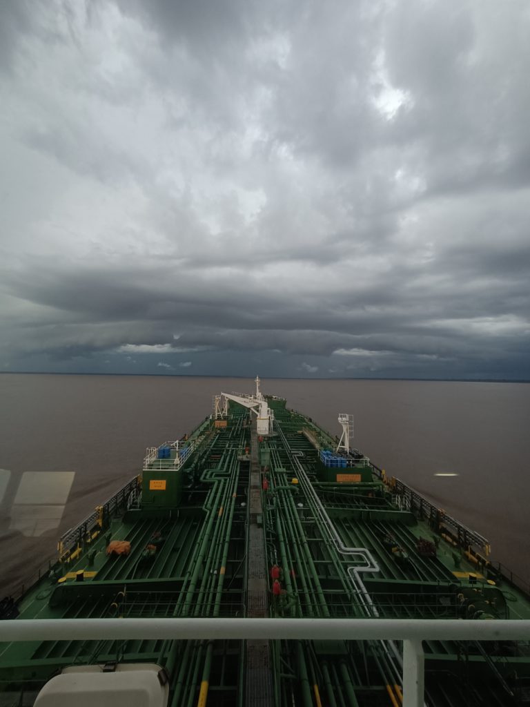 Clouds forming rain in Amazon River