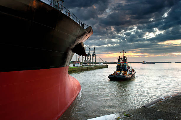 Tugboat working on a Cargo Vessel 